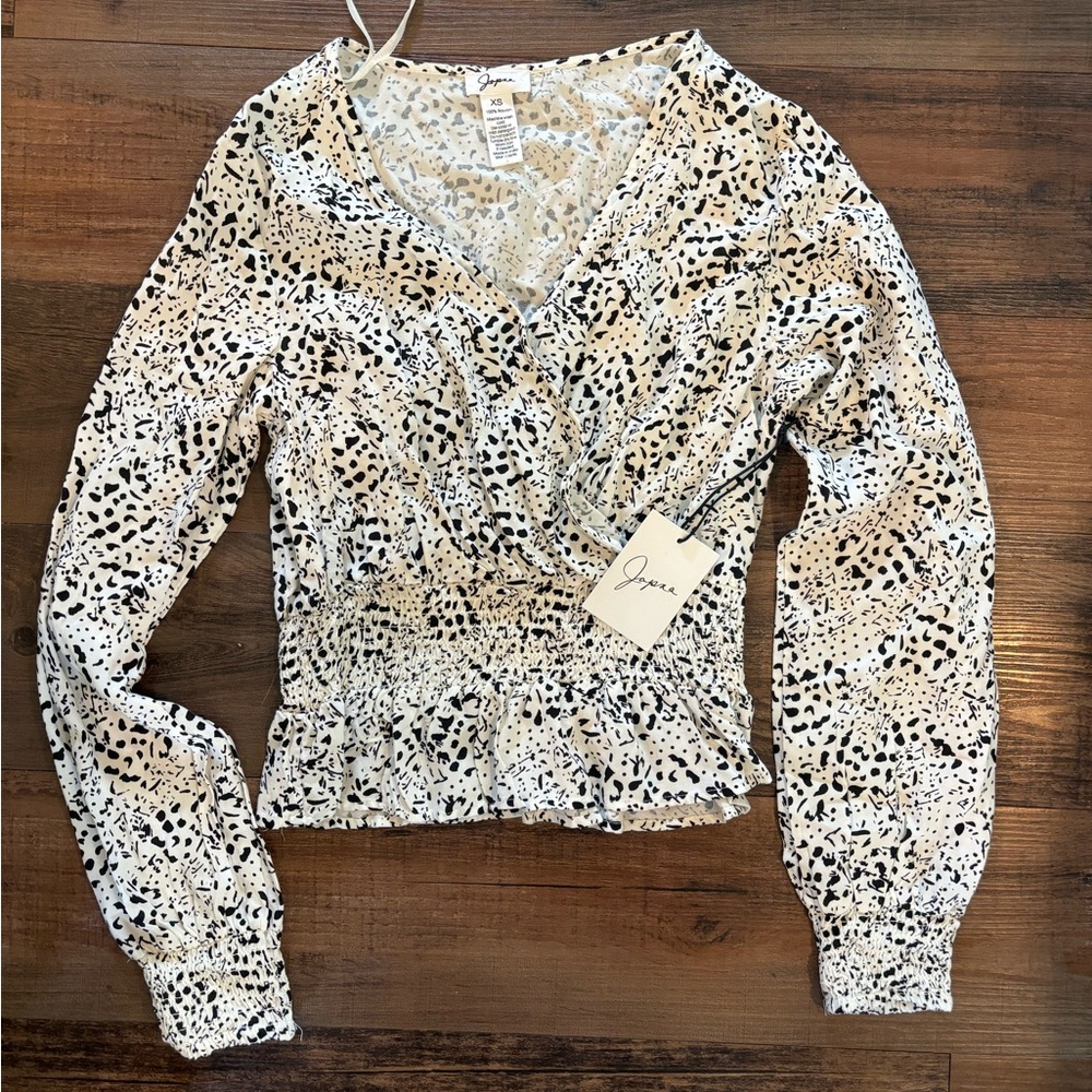 NWT black and white wrapped blouse